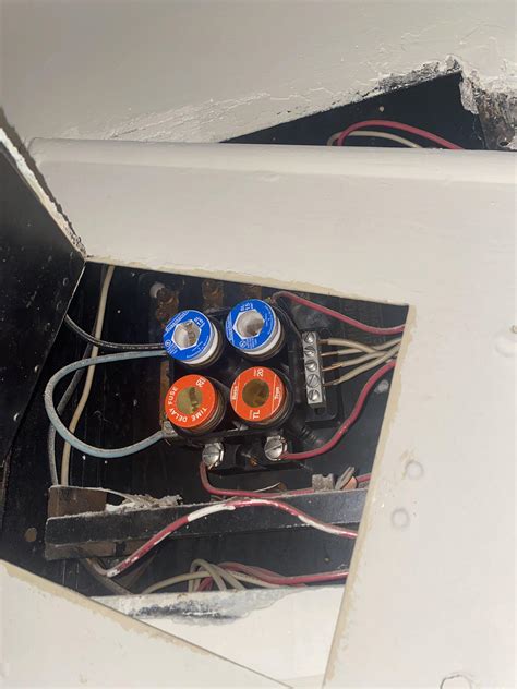 electric fuse box switch won't stay up|how to reset a fuse box.